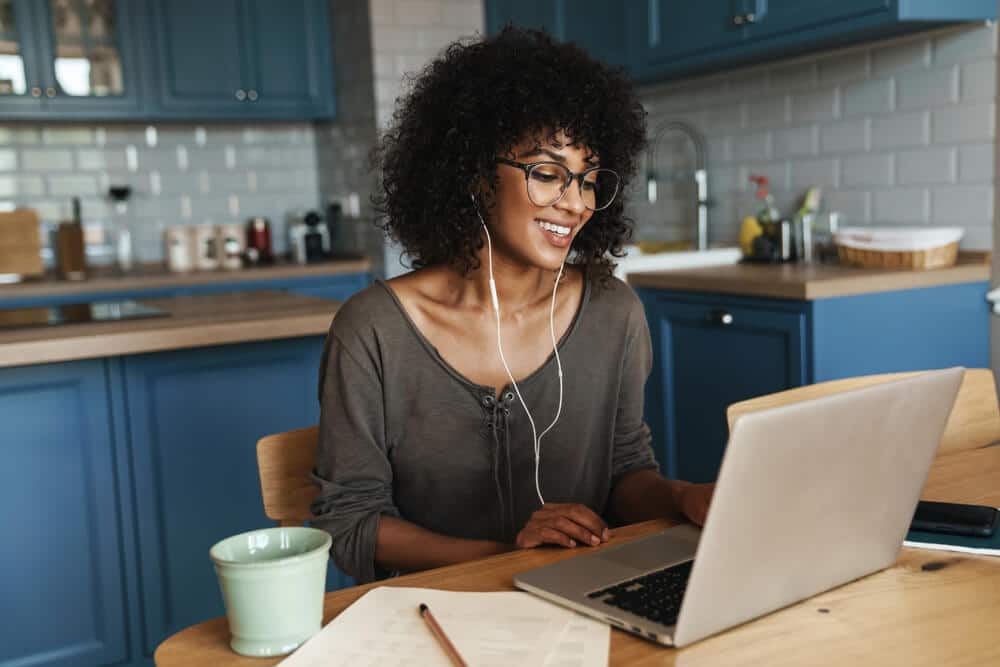 Woman Using Laptop Meeting